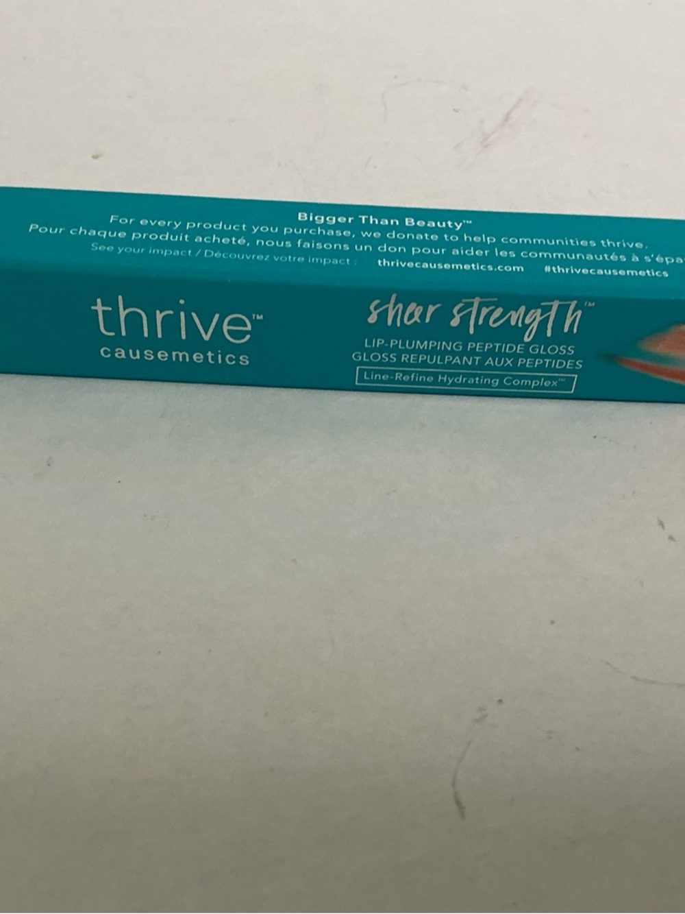 Thrive Causemetics Lip Plumping Peptide Gloss